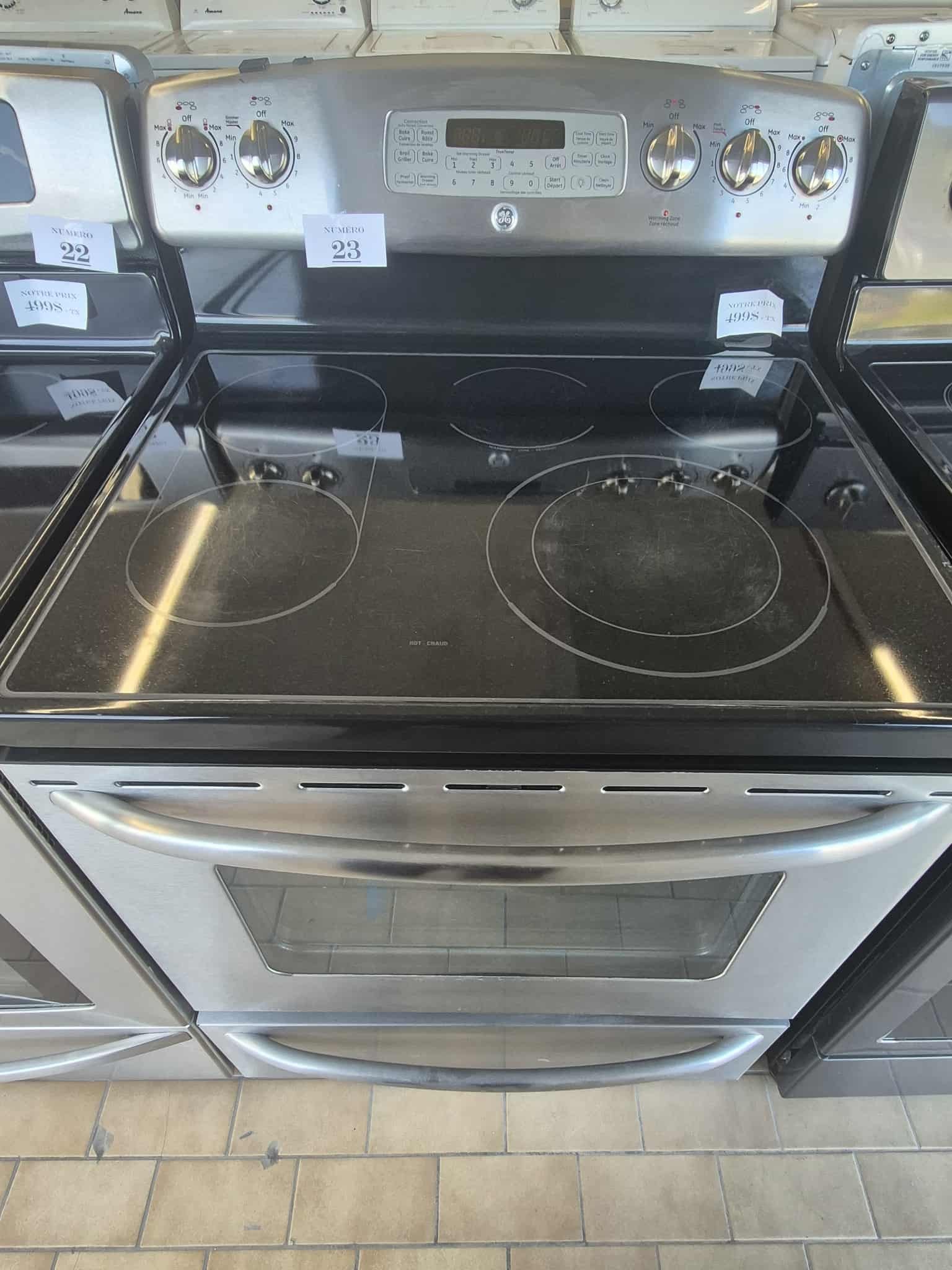 #23 Cuisinière GE vitrocéramique deluxe – Rond pont