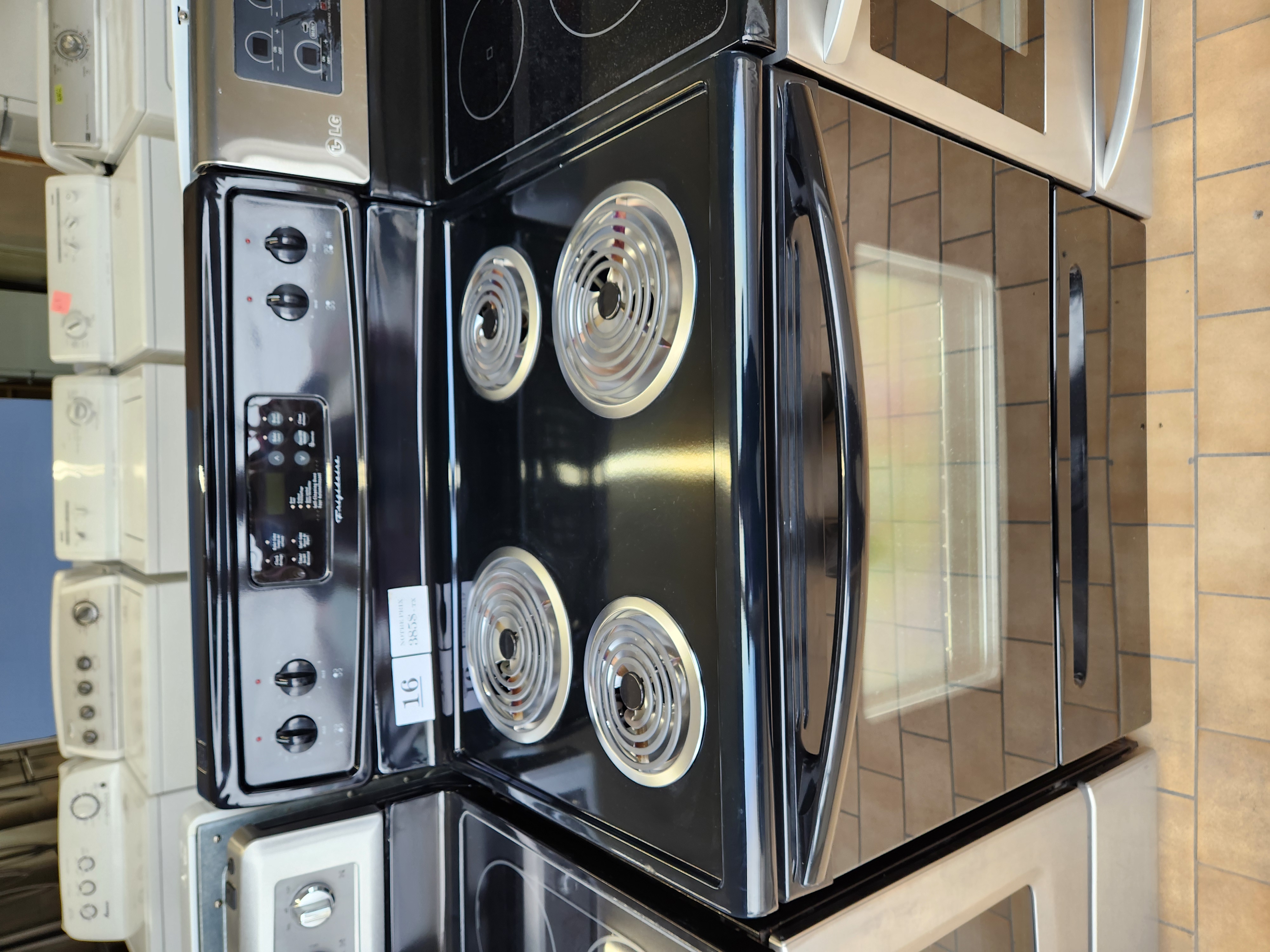 #16   CUISINIERE  SERPENTION NOIRE